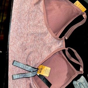 Pink/ Maroon Pink Sport bra never worn. With tags